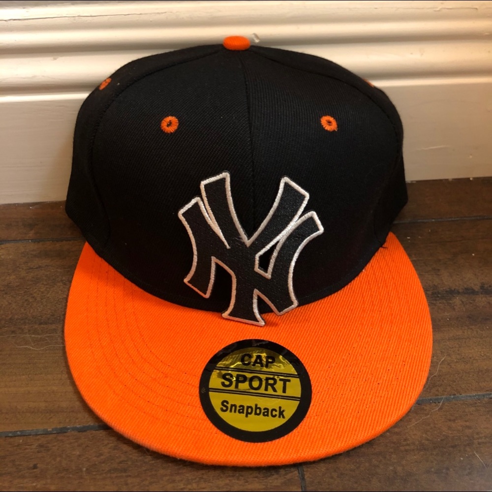 Orange and Black hat with Falcons Patch